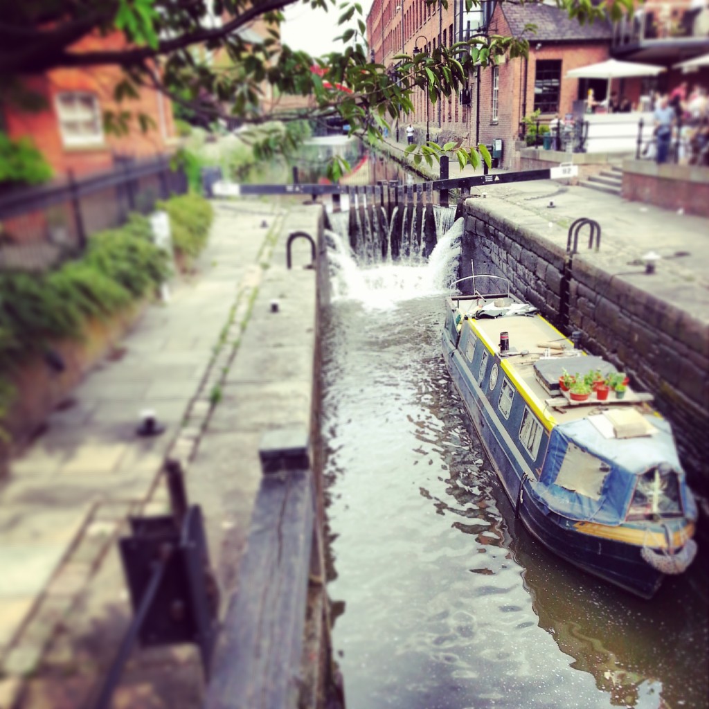 boat in the locks at castlefield manchester