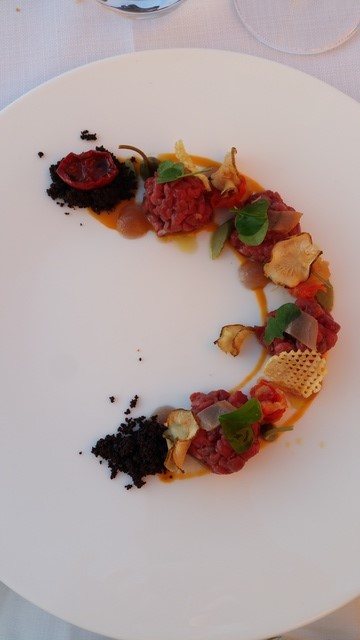 where to eat in tuscany castelfalfi la rocca beef tartare starter hollygoeslightly