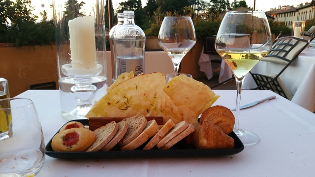 where to eat in tuscany castelfalfi la rocca bread basket hollygoeslightly