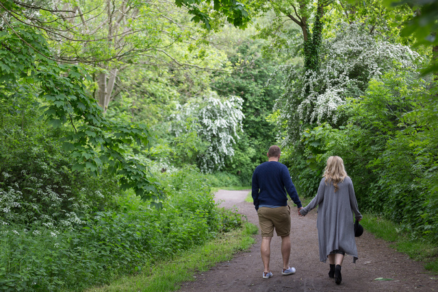 maternity photoshoot in the woods walking away from camera hollygoeslightly