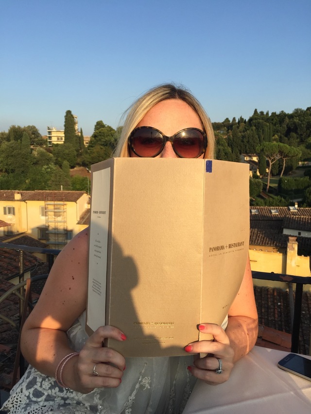 romantic evening in florence peaking over menu hollygoeslightly