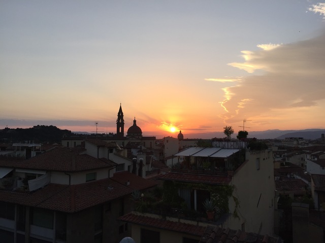 romantic evening in florence sunset rooftops hollygoeslightly