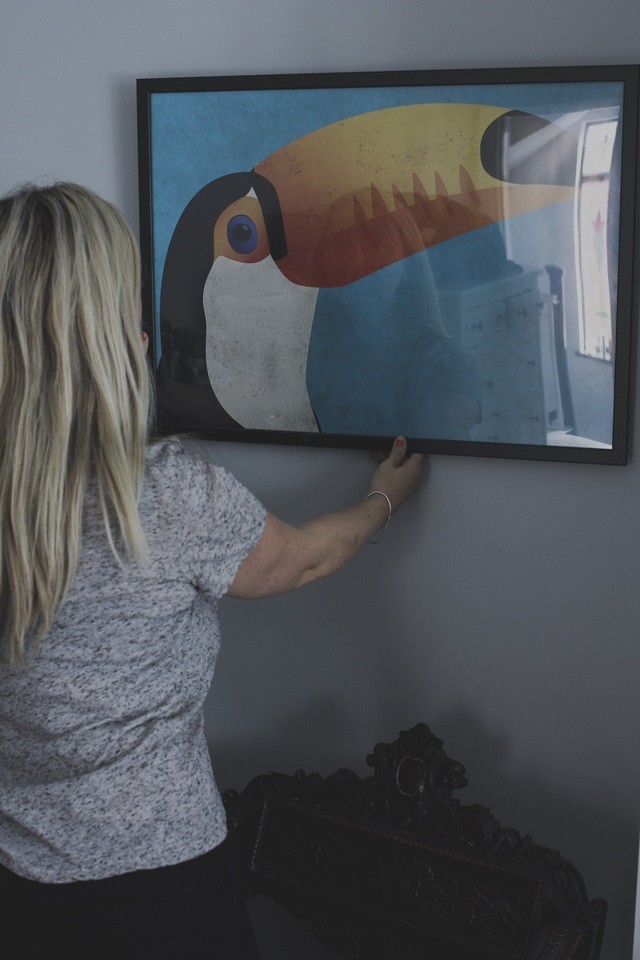 interior design with printed artwork posterlounge toucan print