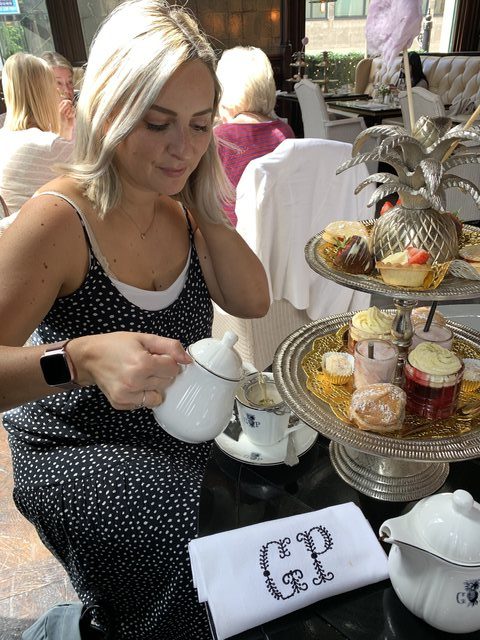 summer high tea at grand pacific manchester hollygoeslightly pouring tea