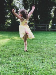 uk family glamping peak district ashbourne heights girl dancing 2