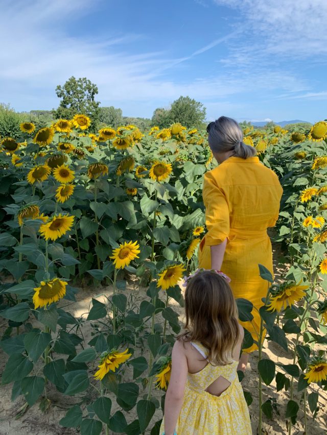 mum and daughter matching dresses boden sunflower field