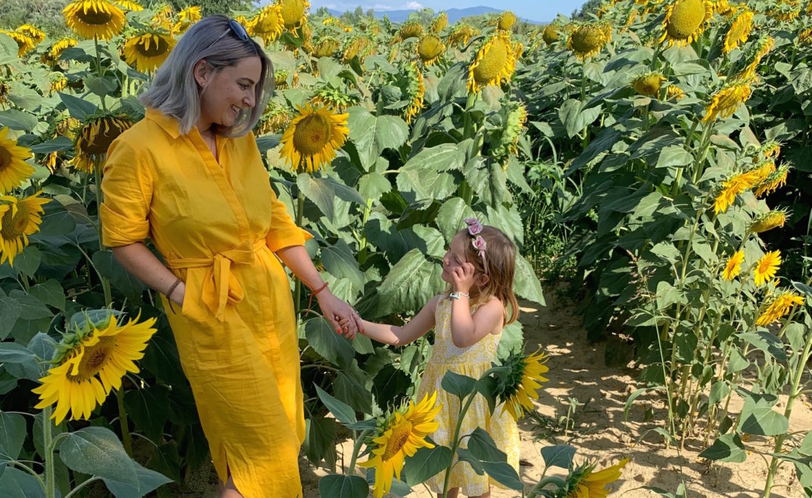 mum and daughter matching dresses boden sunflower fields title