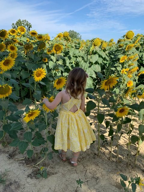 mum and daughter matching dresses boden sunflower fields tuscany